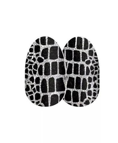 Color Street nail strips in black and white geometric pattern design called Hiss and Make Up