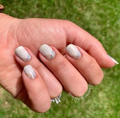 Beige with Details of gray and tan. Color Street nail strips.