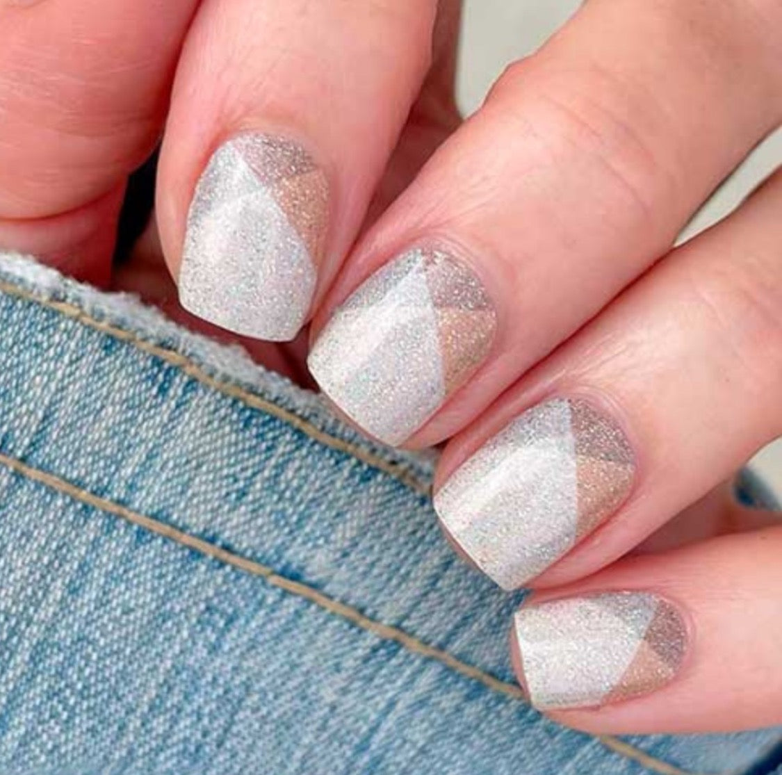 Beige with Details of gray and tan. Color Street nail strips.