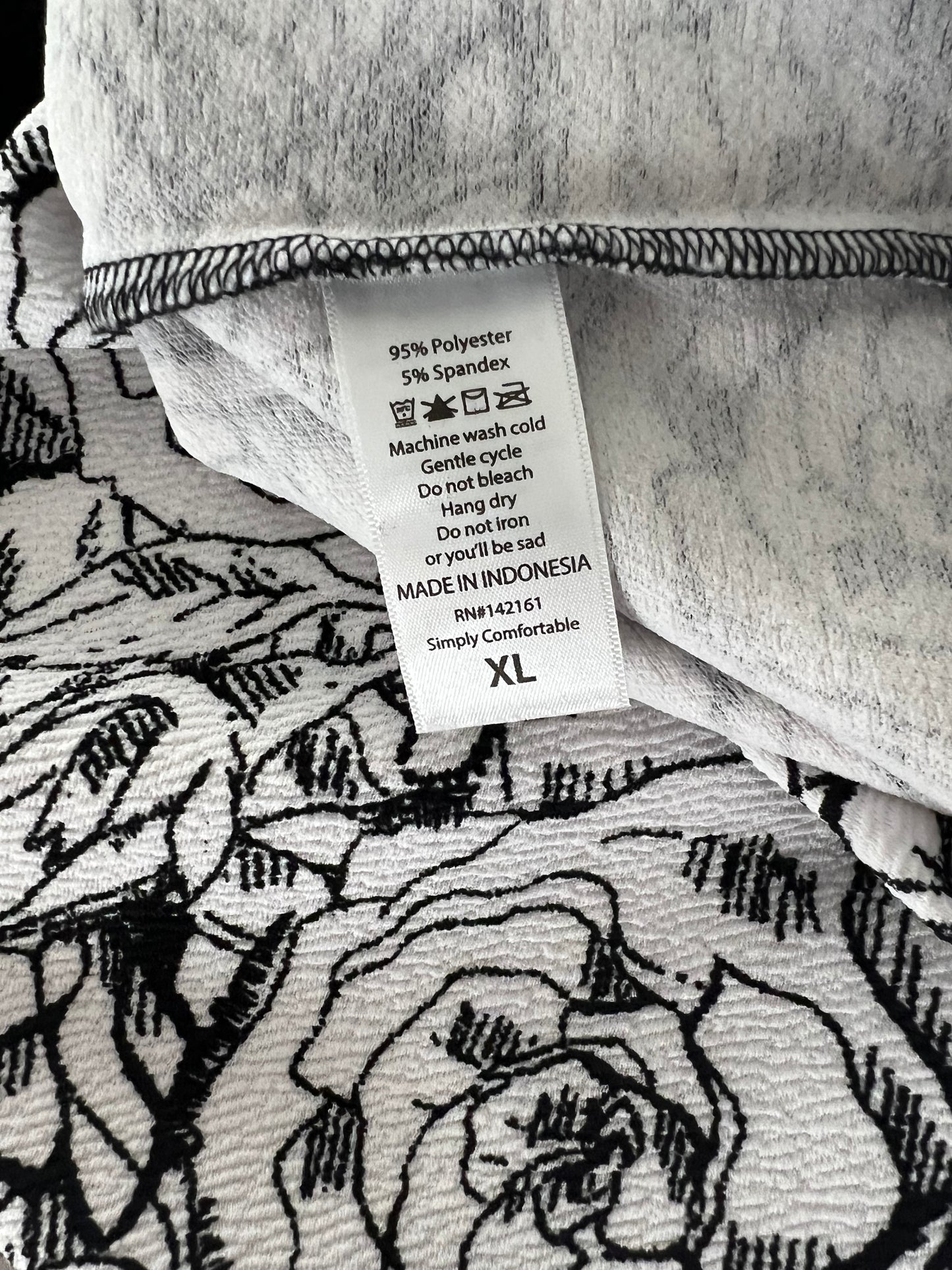 The LuLaRoe Debbie Dress - Black and White Roses