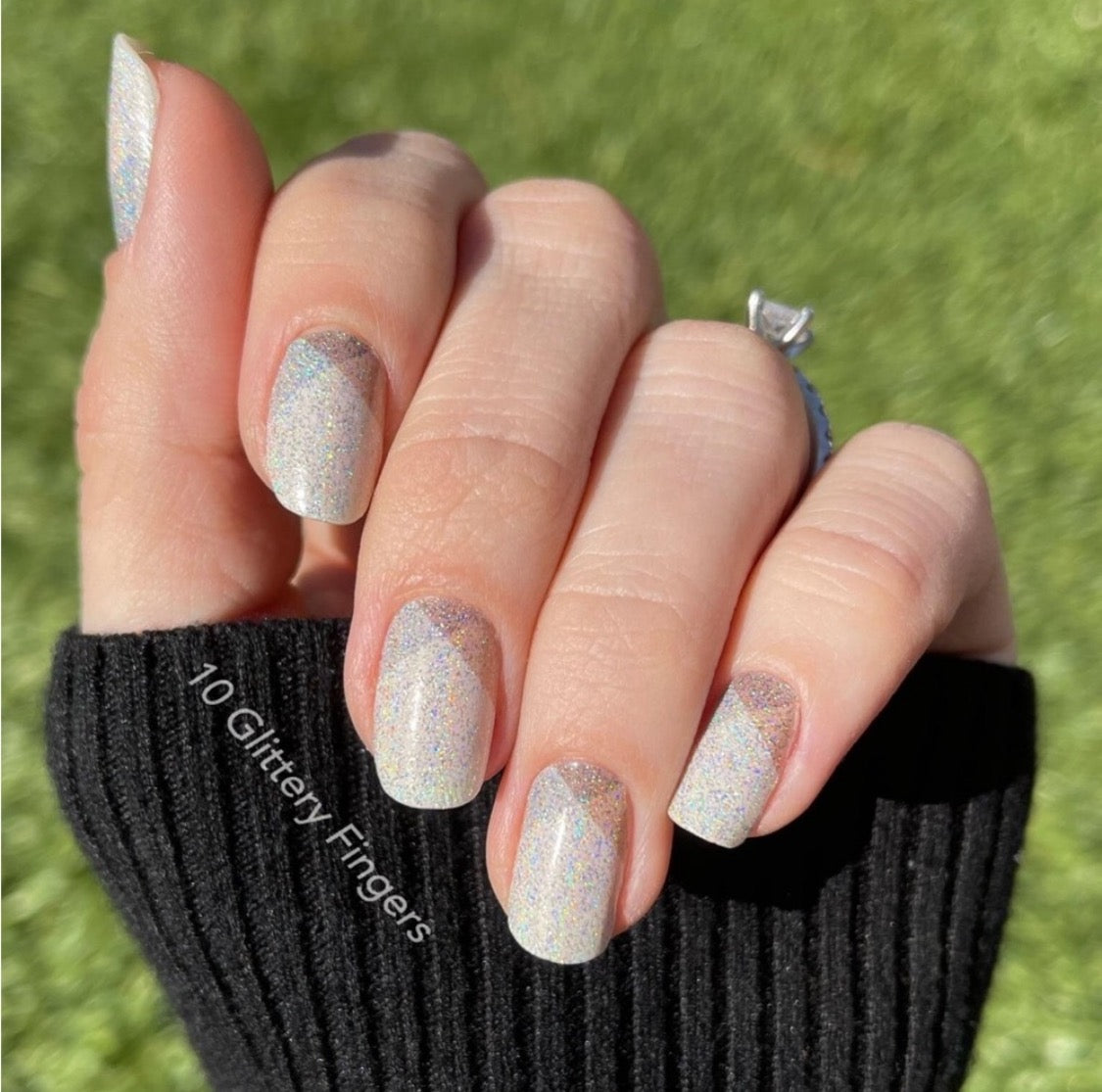 Beige with Details of gray and tan. Color Street nail strips.